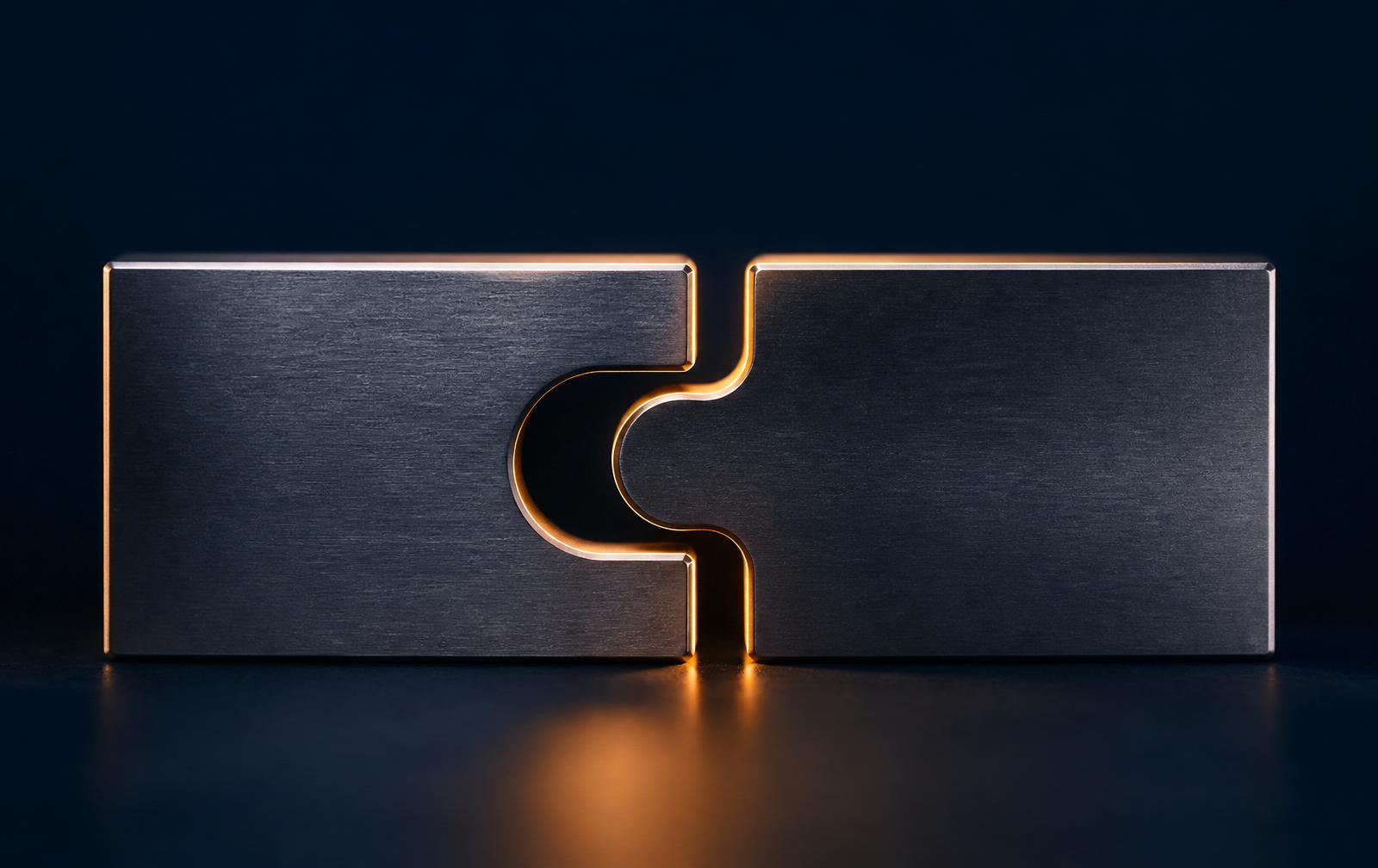 Two machined metal forms aligning into one, lit with warm gold along the joining edge